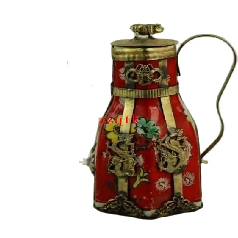 

Xinglong a hand decorated porcelain teapot and a pair of Miao silver goblets