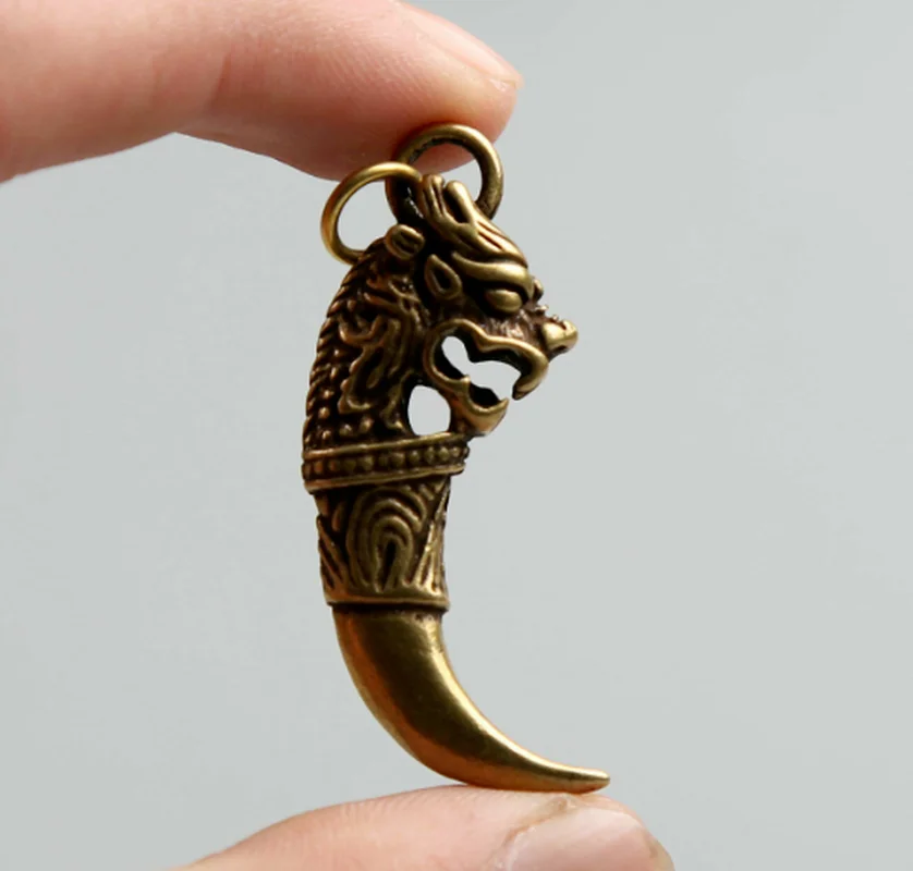 

Hot Selling 1.8"Curio Chinese Bronze Auspicious Dragon Head Tooth Shape Small Amulet Pendant for Women Men Fashion Accessories