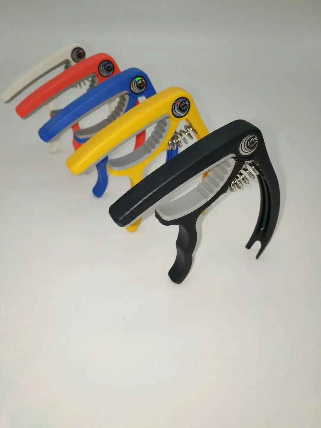 

Пластиковый стальной каподастр, фольклорный каподастр для акустической гитары, каподастр для укулеле, аксессуары для музыкальных инструме...