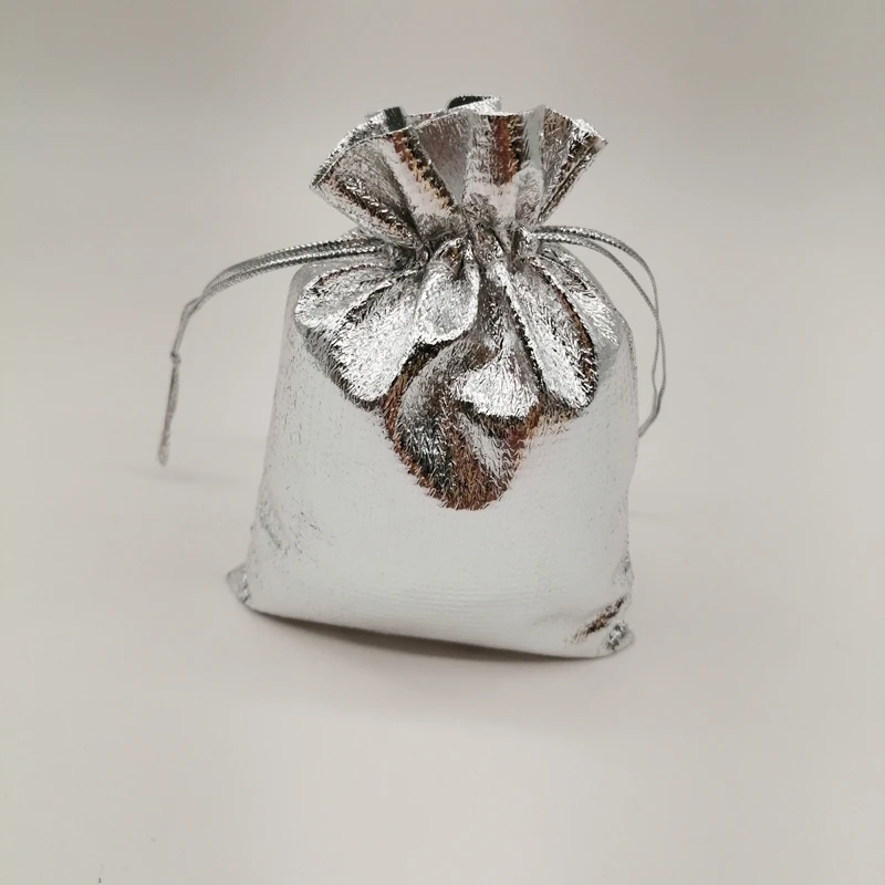 

Золотые, серебряные мешочки на шнурке