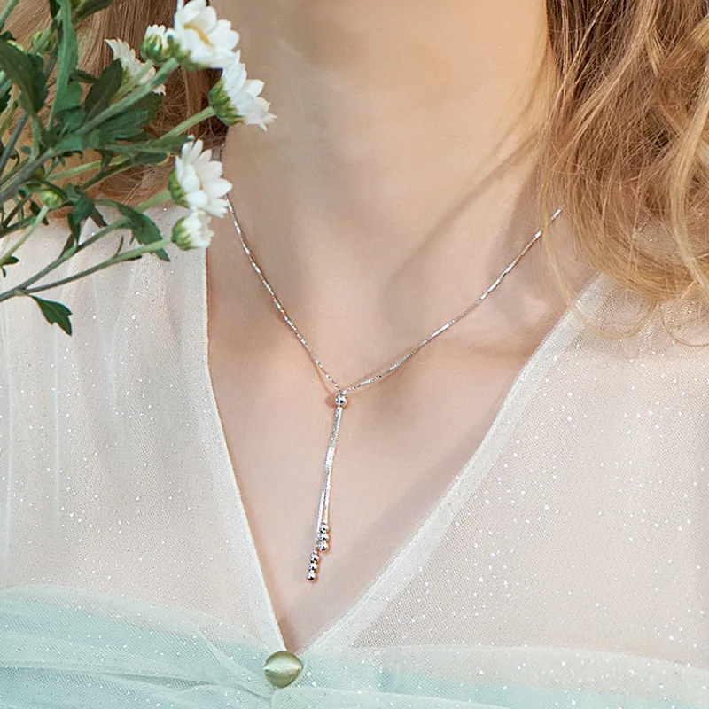 Цепочка женская из серебра 925 пробы с кисточками и змеиной костью | Украшения