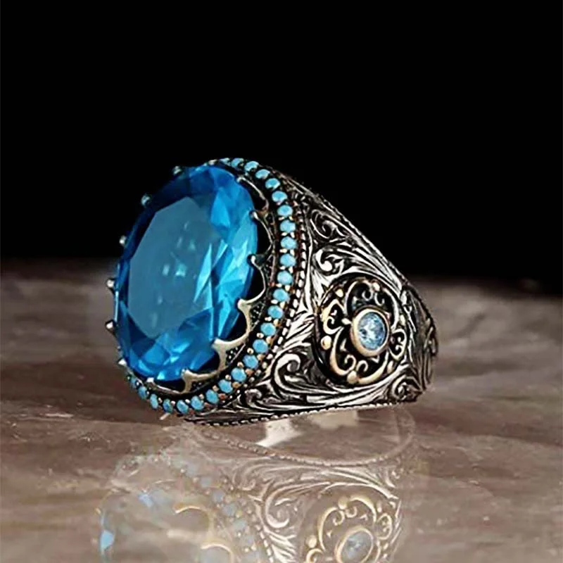 

Wholesale Egg-Shaped Blue Crystal Carved Pattern Alloy Female Ring for Women Party Engagement Jewelry Hand Accessories Size 7-12
