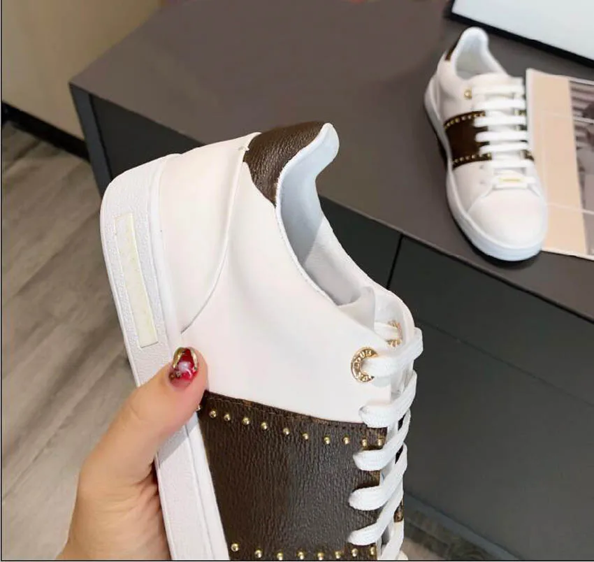 

2021 luxury brand ladies sneakers ladies casual shoes rivet ladies fashion high-end designer white black shoes