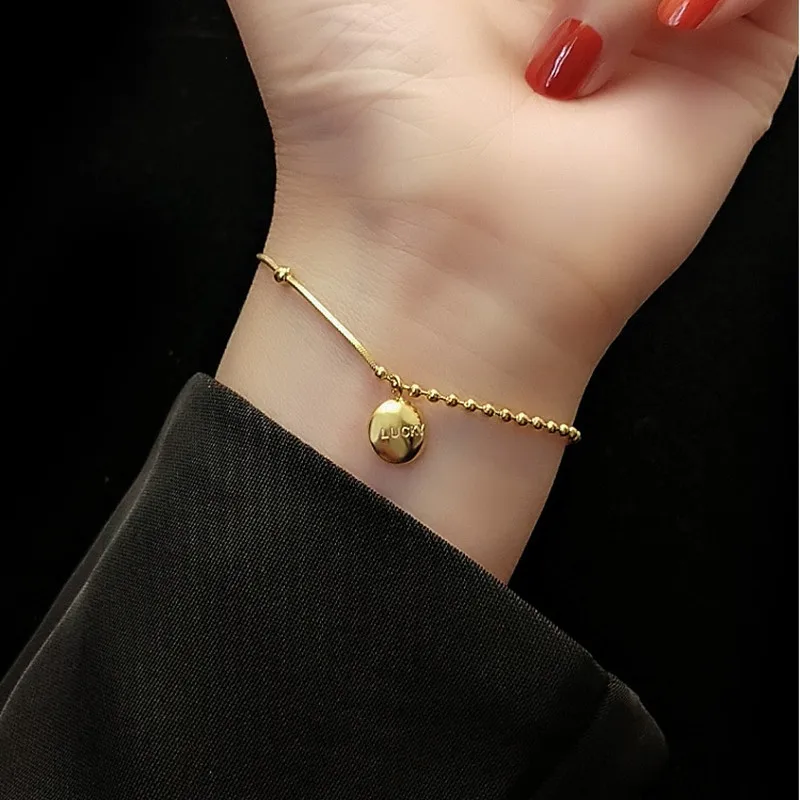 

Позолоченные круглые браслеты-талисманы из нержавеющей стали с надписью на удачу для женщин, браслет-цепочка со змеиным плетением на руку, ...
