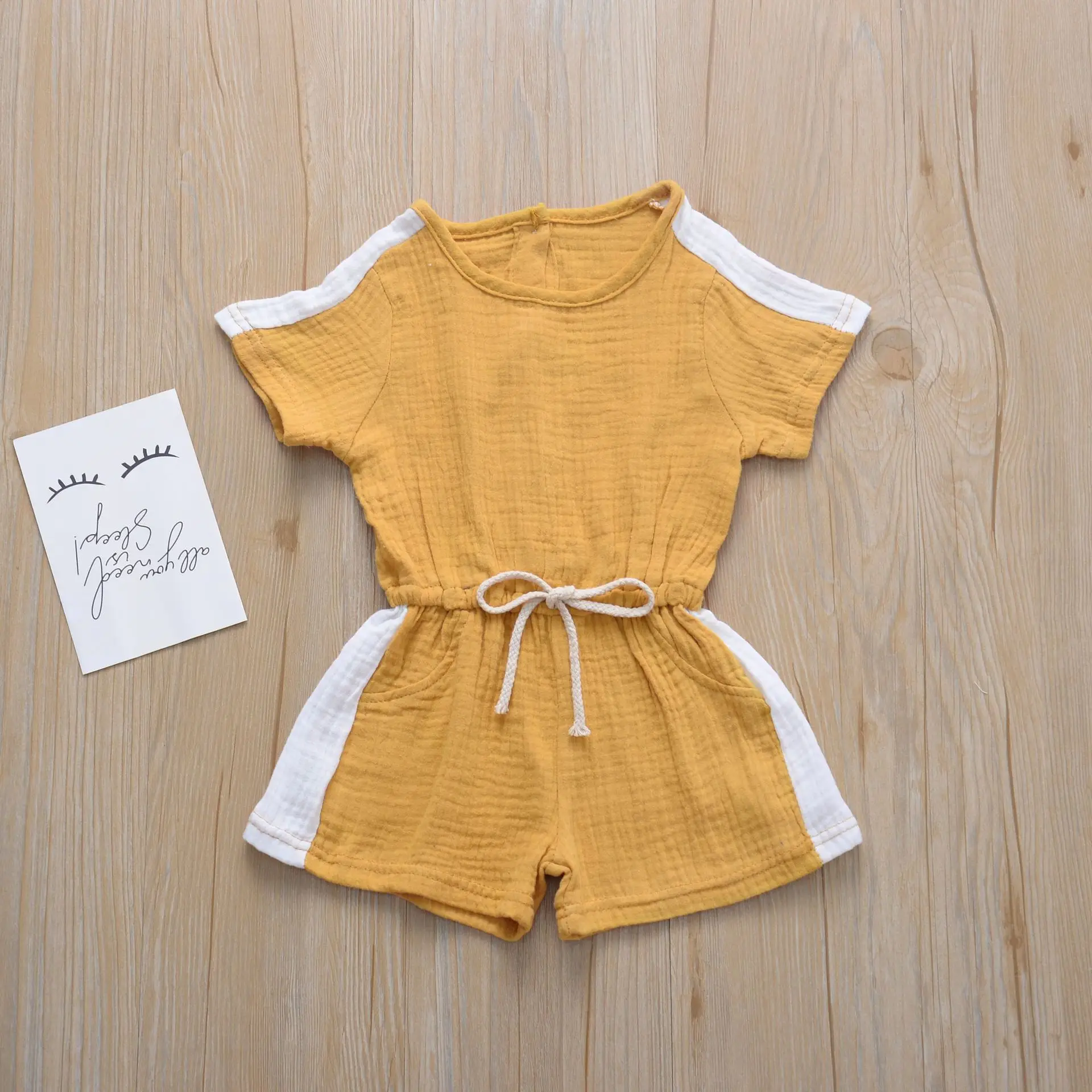 Детский однотонный комбинезон на завязках хлопковый с коротким рукавом в стиле