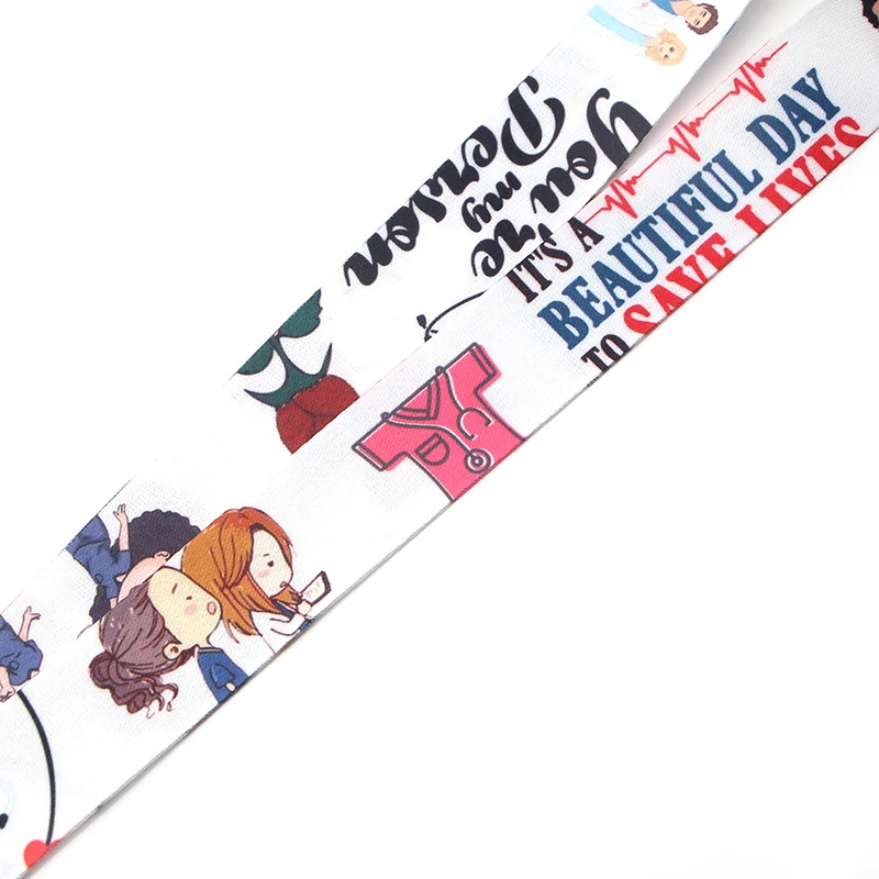 Серый анатомический брелок для ключей с мультяшными серыми телефонными шнурками