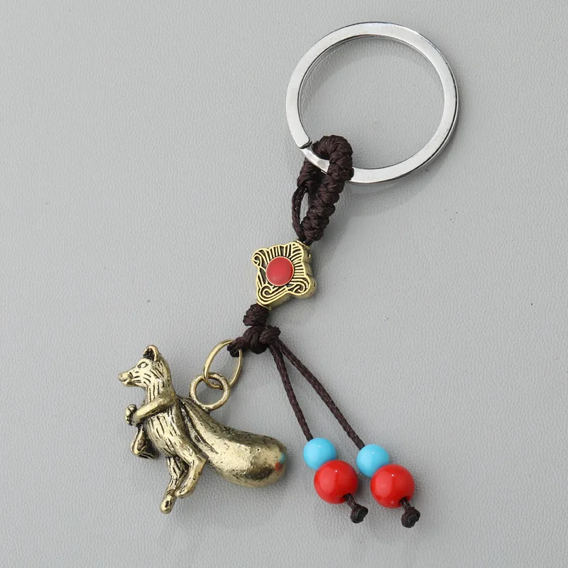 Металлический брелок в виде животных