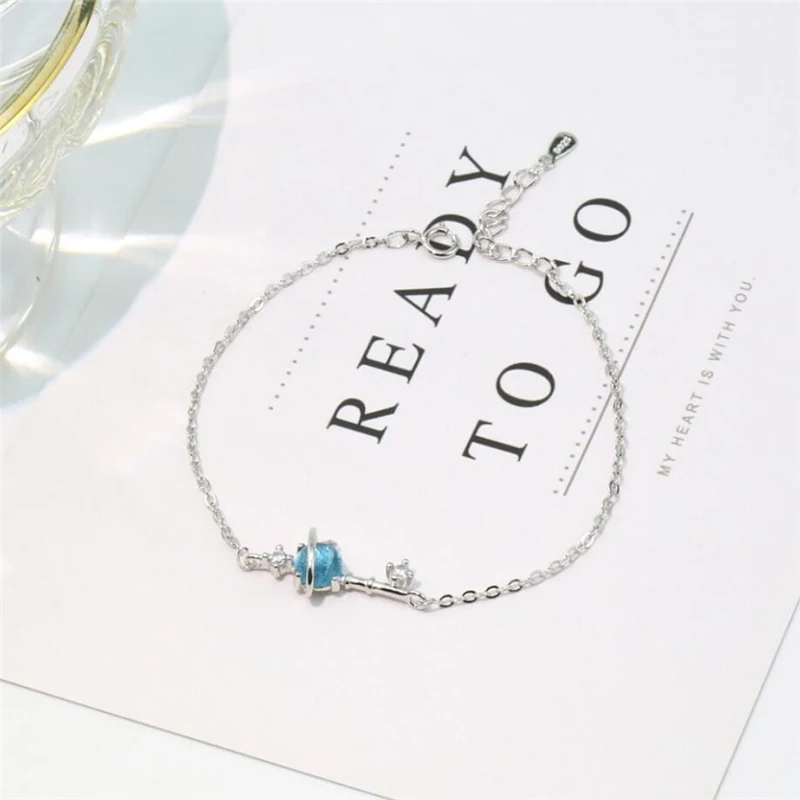 Браслет с голубым кристаллом и звездами|Гибкие жесткие браслеты| |