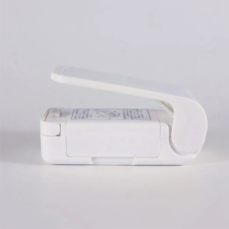 

Portable Mini Sealing Household Machine Heat Sealer Capper Foodsaver For Plastic Bags Package Mini Sealing Gadgets Pink White