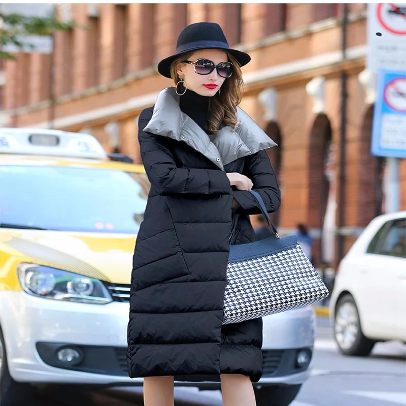 

Женская куртка на белом утином пуху, с воротником-стойкой