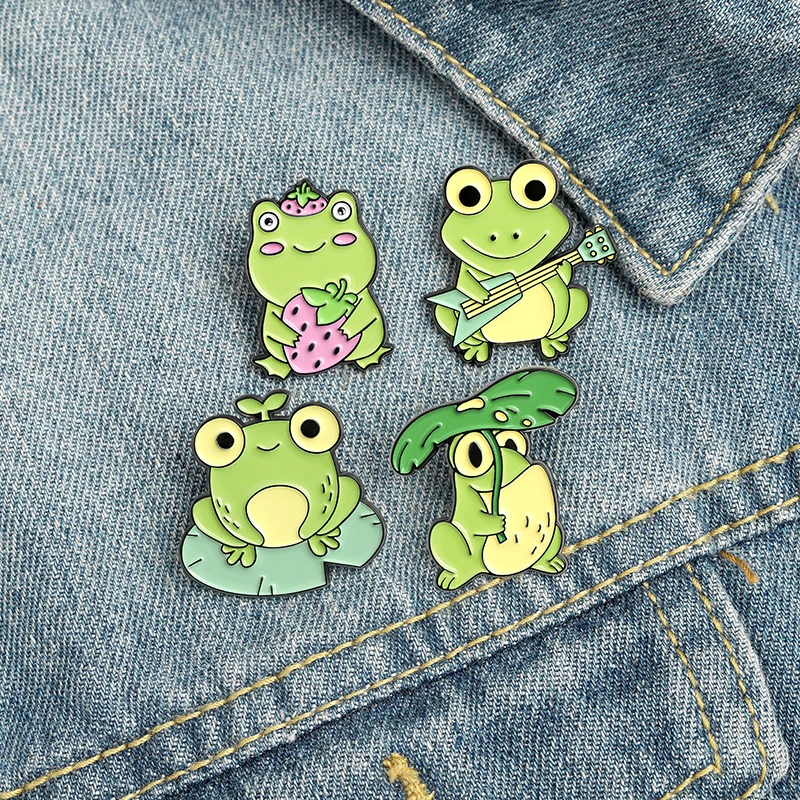 

Little Frog Cartoon Pattern Children Cute Enamel Brooches Green Animal Plant Instrument Pins Gift For Kids Friends Custom