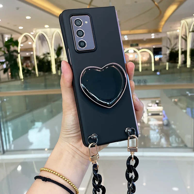 

For Samsung Galaxy Z Fold 2 3 5G Fashion Cute Love Heart Stand Holder With Hand Chain Bracket Handbag Protective Case Cover