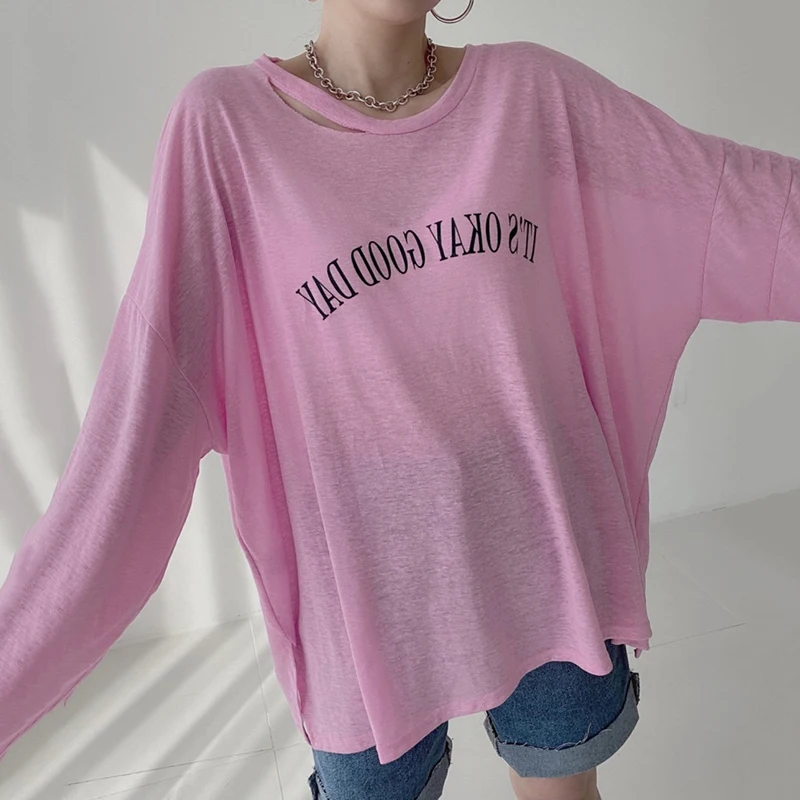 

Korea Early Autumn All-match Candy Color T-shirt Female Round Neck Hollow Letter Printing Loose Thin Sunscreen Top DK1175