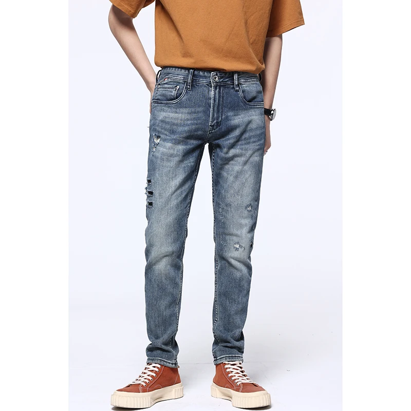 

2021 Four Seasons Blue Slim Feet Retro Distressed Ripped Tide Brand Fashion Jeans Men's New High-end Denim Trousers Trend