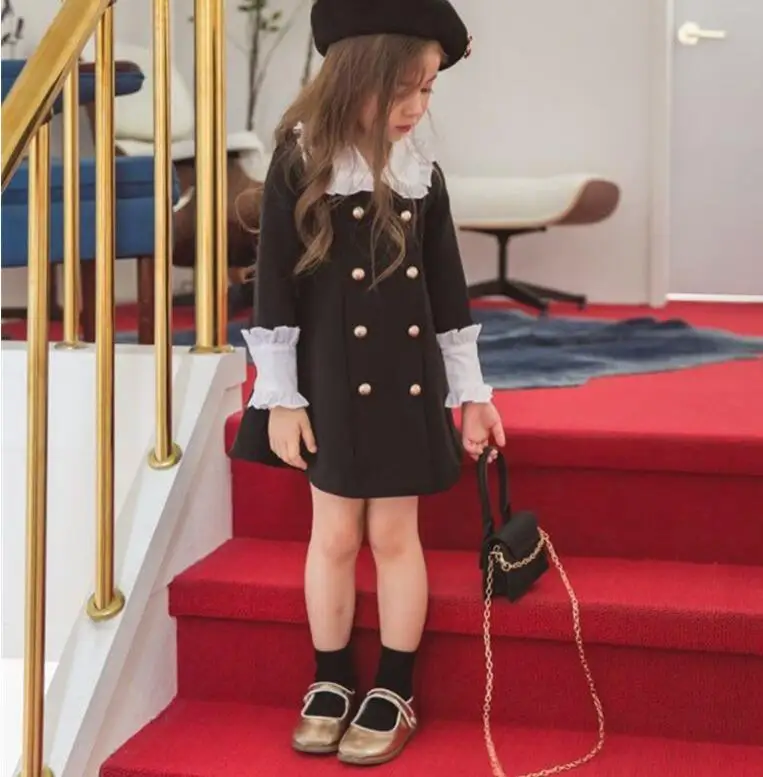 Черно-белое платье в стиле пэчворк 2019 г. Осенне-зимние двубортные платья с