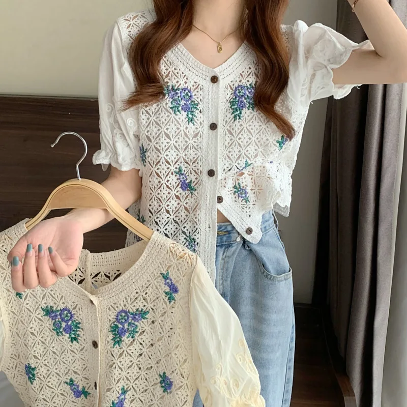 

New Summer Womens Embroidered Blouse Elegant O-Neck Short Puff Sleeve Single Breasted Hollow Out Tops Female Blusas 2021