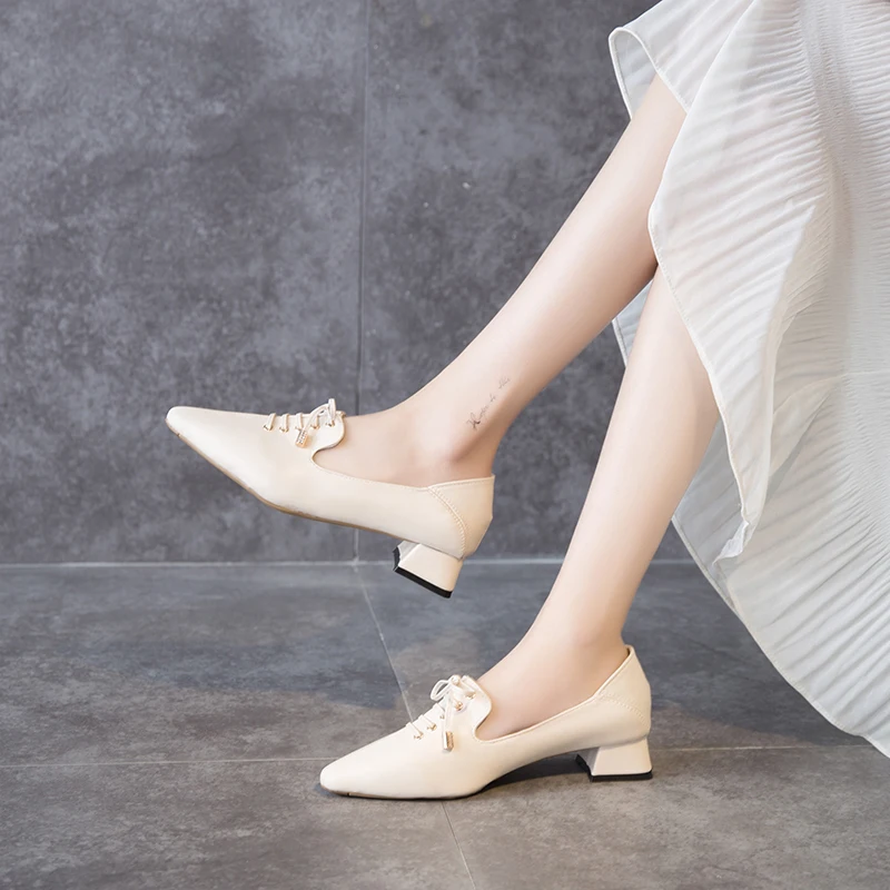 

2020 spring new bowknot shallow mouth pointed shoes after stepping on thick heel women's shoes wild low heel women's shoes Z681