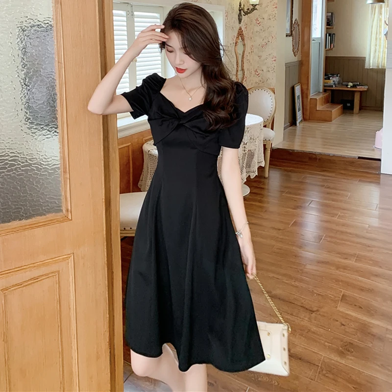 

Женское винтажное платье-миди с V-образным вырезом