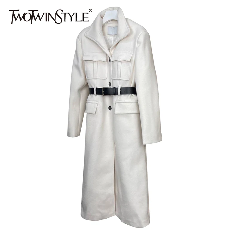 

TWOTWINSTYLE White Temperament Patchwork Pocket Women's Autumn Coat Lapel Long Sleeve Sashes Slim Overcoat Female 2021 Style New