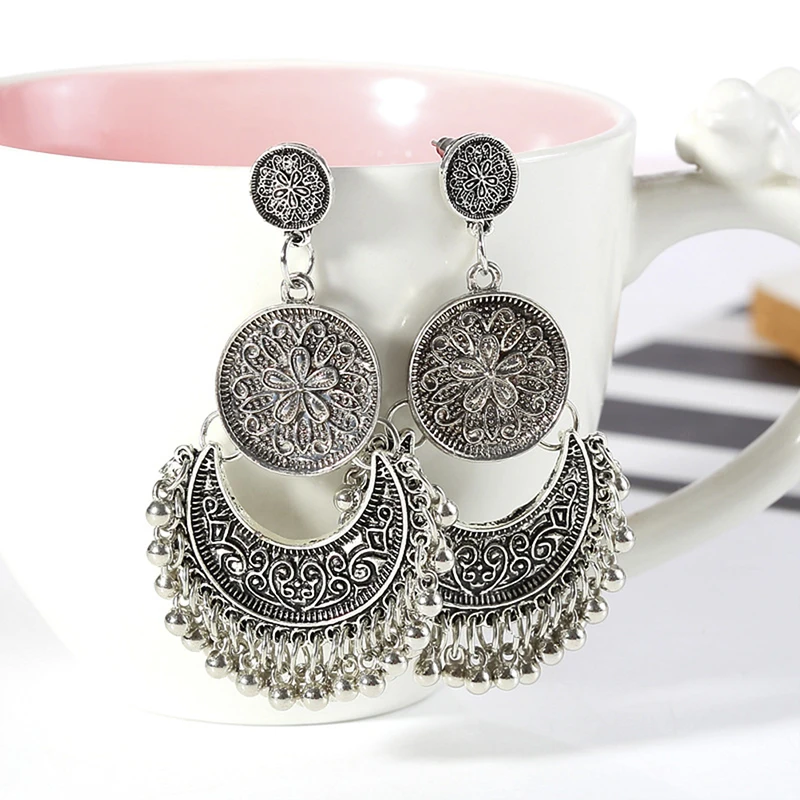 

Hot New Earrings Dream Catcher Hollow Out Vintage Leaf Feather Dangle Earrings Bohemia Ethnic Style Earring For Women