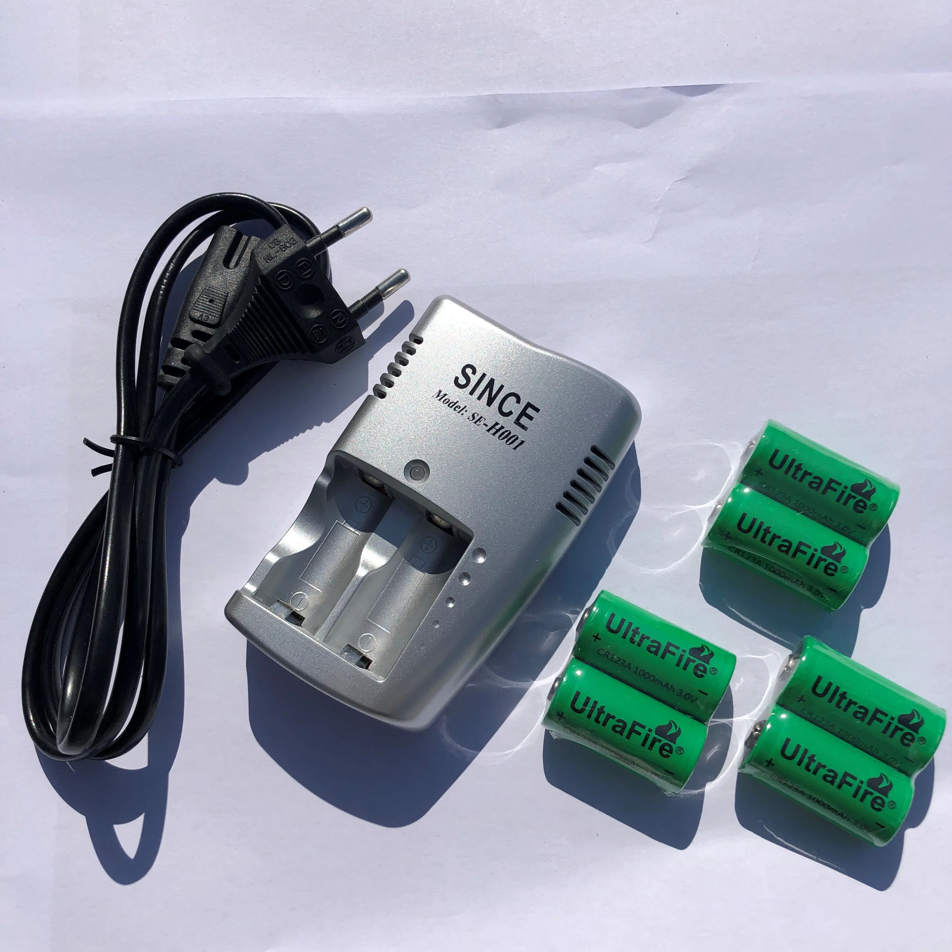 Батарея + зарядное устройство. Новый 3V CR123A 16340 1000mah перезаряжаемая батарея