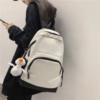 simple nylon student schoolbag casual unisex zipper backpack black white college student solid color backpack cartoon pendant