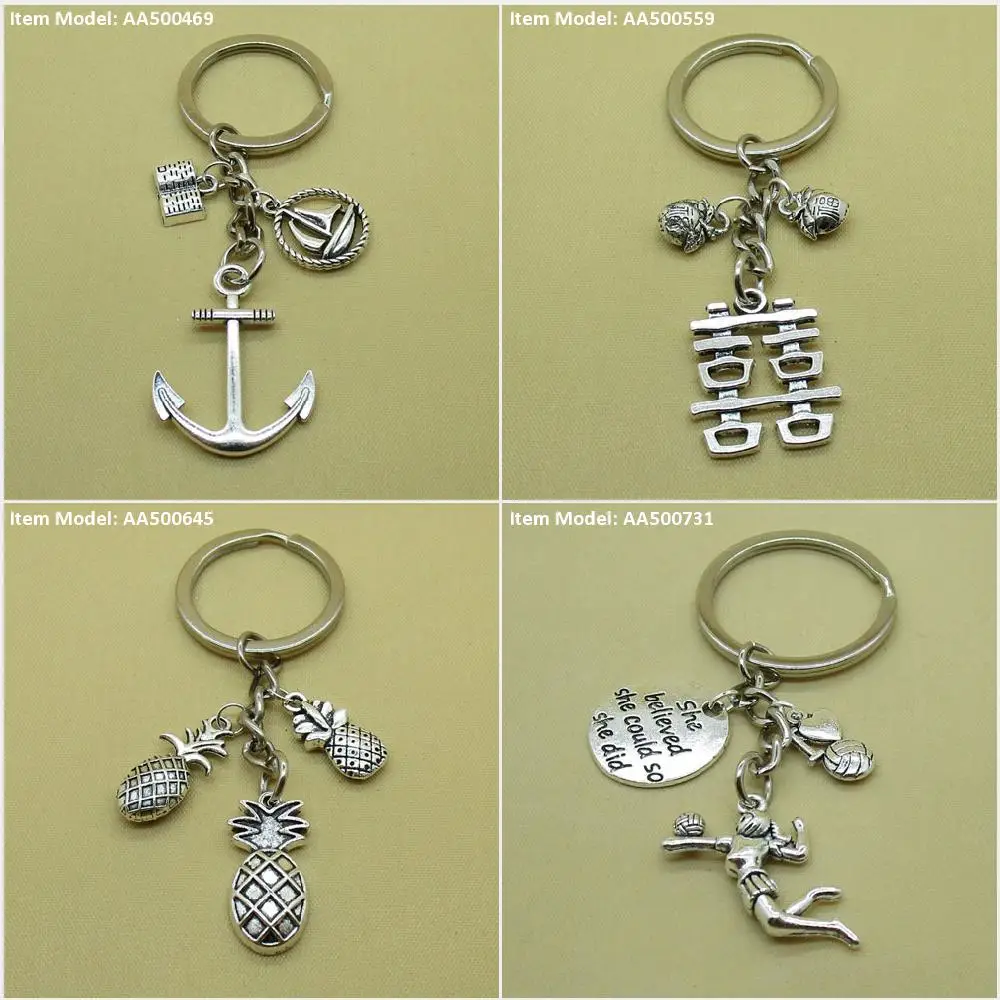 Брелок для ключей якорь лодка парусник книги счастье двойной персик