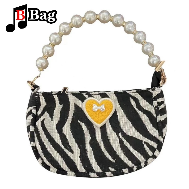 Женская мини-сумка через плечо с принтом зебры и бантом жемчужной цепочкой |