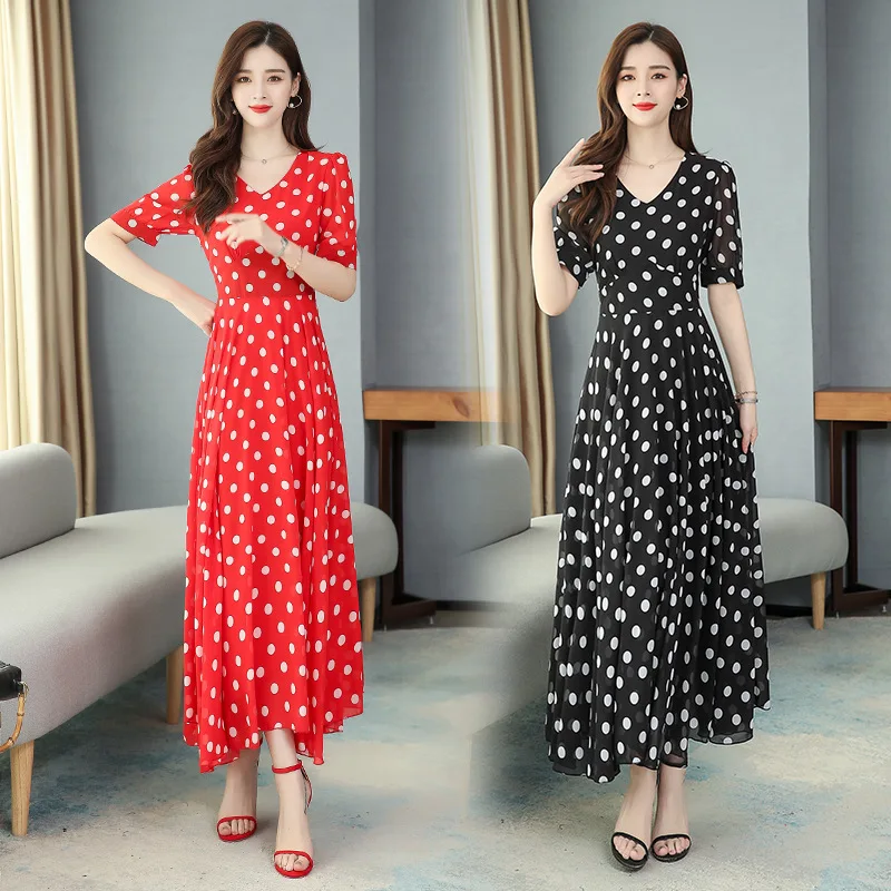 

the new Korean version of the large size dress has a long dress with short sleeves and chiffon beach dresss