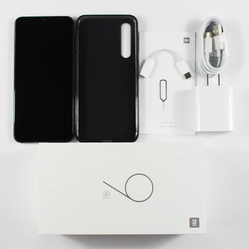Смартфон Xiaomi Mi 9 SE 6 ГБ 64 Snapdragon 712 5 97 дюймов AMOLED дисплей 48 МП основная камера 18 Вт