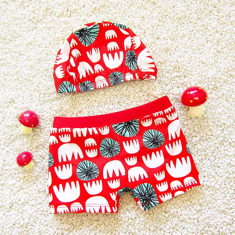

Male baby new swimming trunks swimwear children Korean students hot spring baby split boxer suit with swimming cap