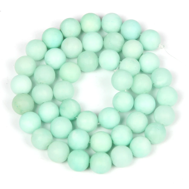 Круглые бусины из матового светло-зеленого агата незакрепленные натурального