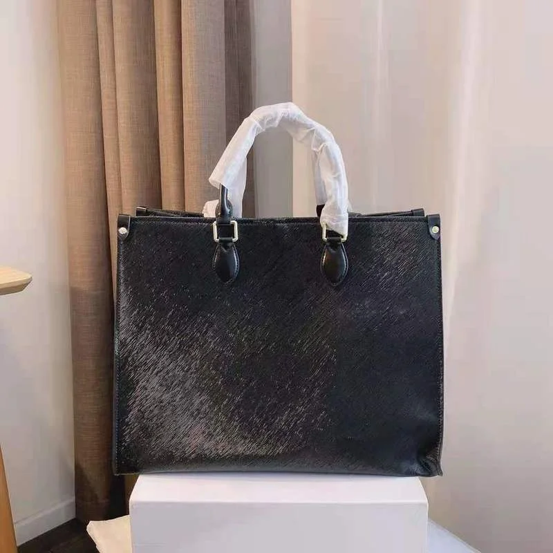 

2021 spring new style, large-capacity water ripple leather handbags, handbags, fashion and leisure all-match shoulder bags