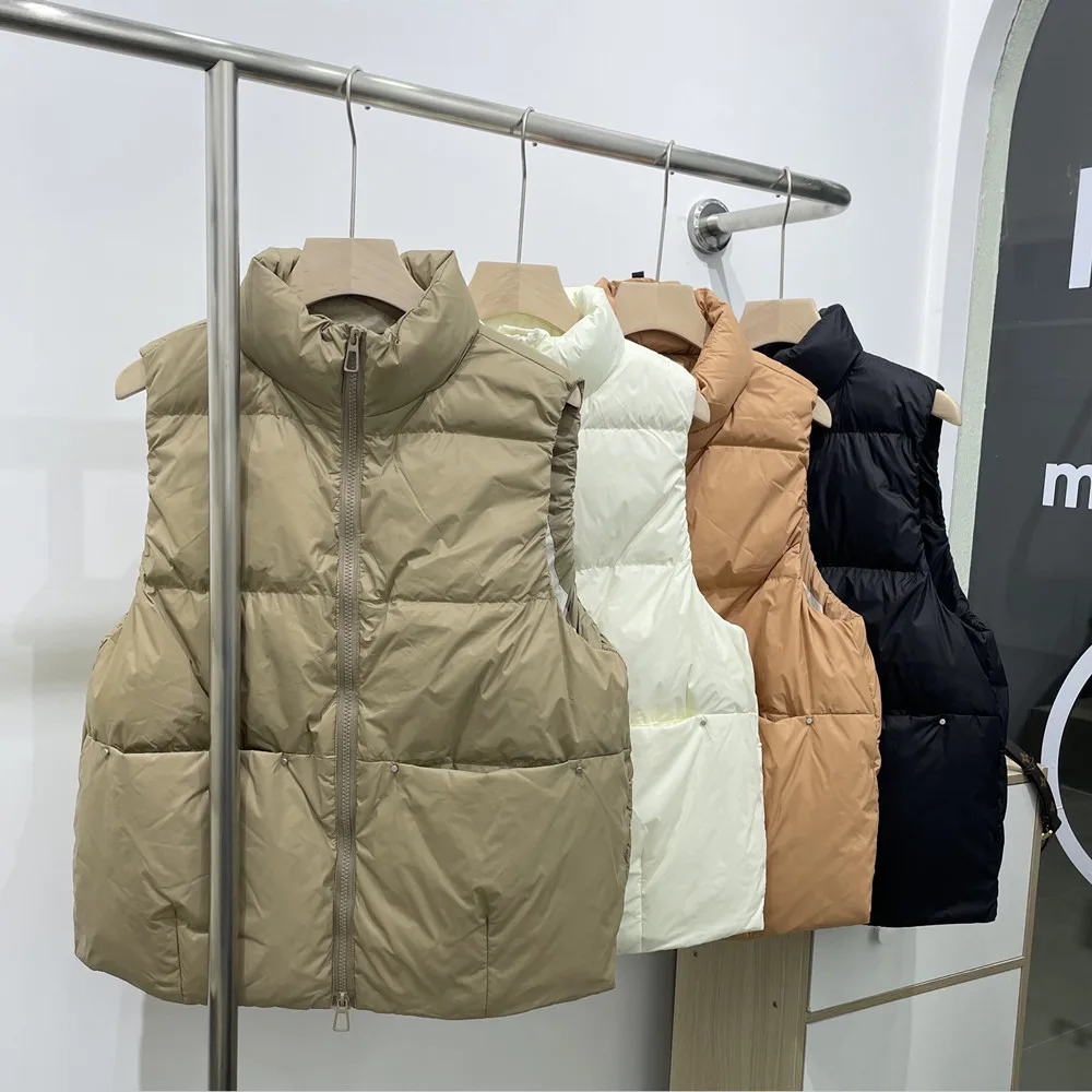 

Женский Повседневный жилет на белом утином пуху, свободная теплая куртка с большими карманами и заклепками на пуговицах, с воротником-стойк...