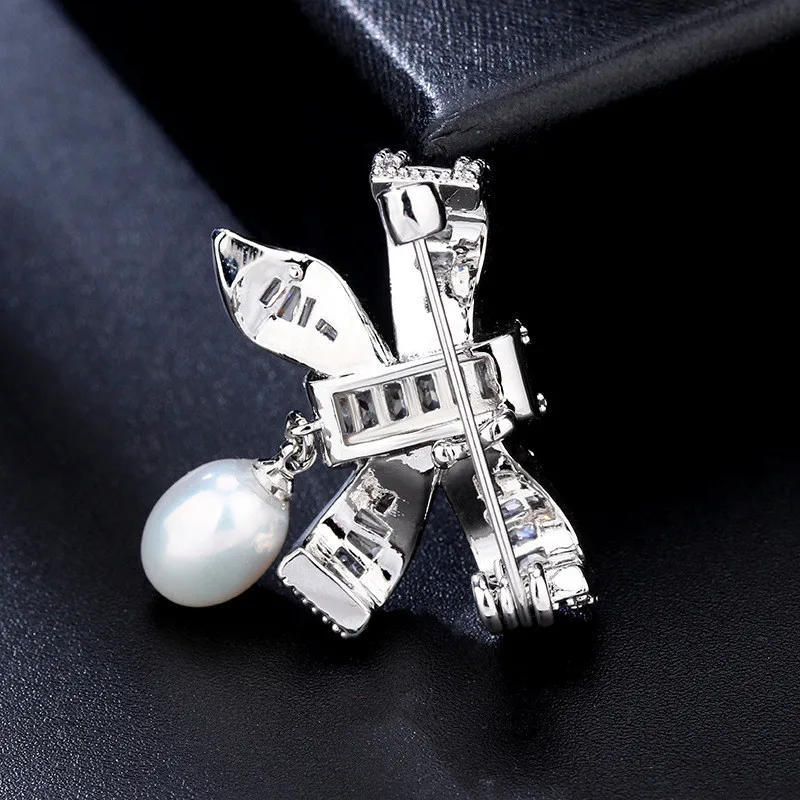 FXLRY New elegant bow freshwater pearl brooch micro-inlaid zircon pin fashion women coat | Украшения и аксессуары