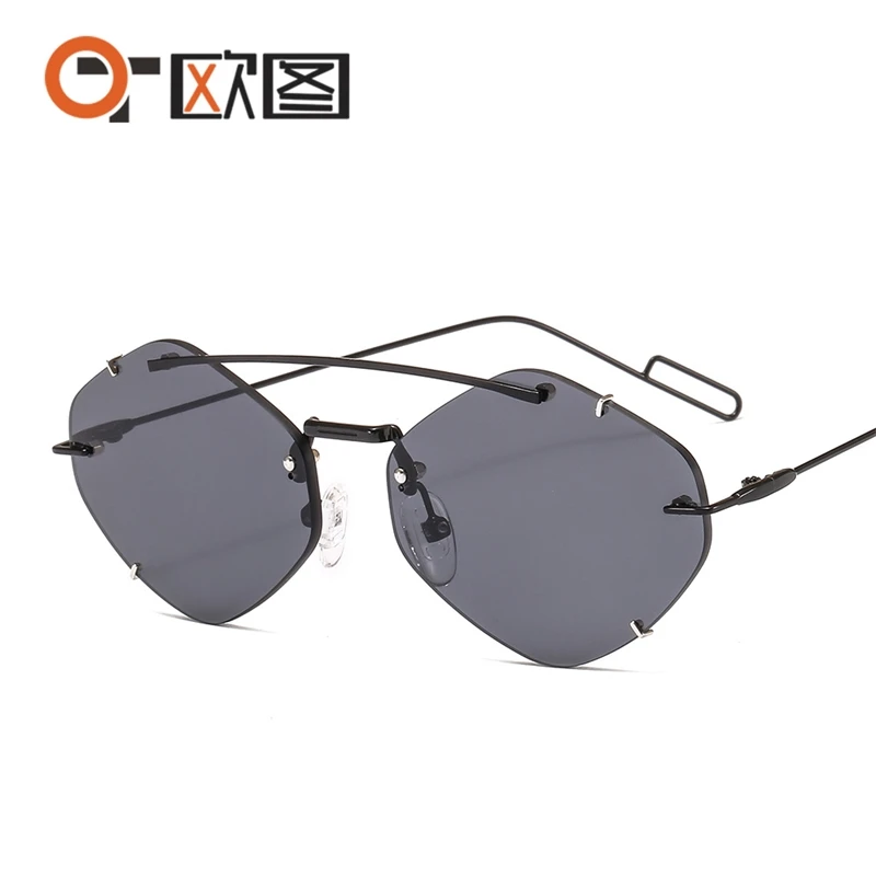 

Metal rimless Sunglasses modern show personality Sunglasses men's and women's small frame irregular 6604