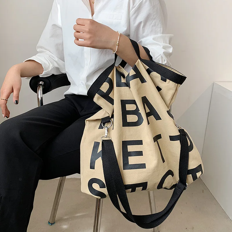 

Crossbody bag Korea ins autumn and winter new simple letter canvas bag large-capacity shopping bag lazy wind handbag