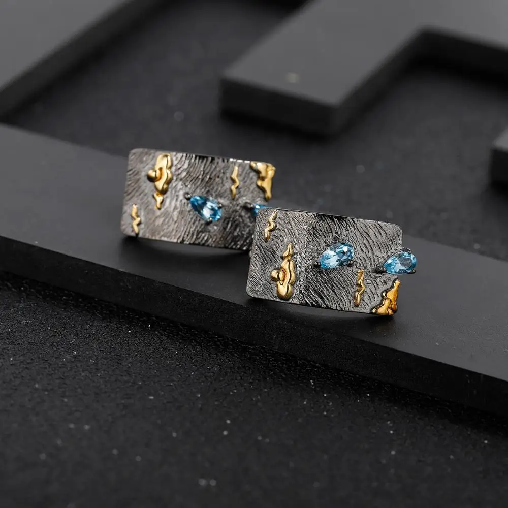 Серьги-клипсы женские из серебра 925 пробы с натуральным голубым топазом |