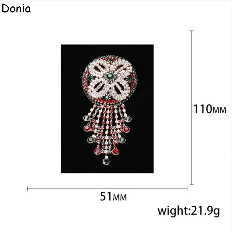 Женская круглая брошь в виде цветка с кисточкой