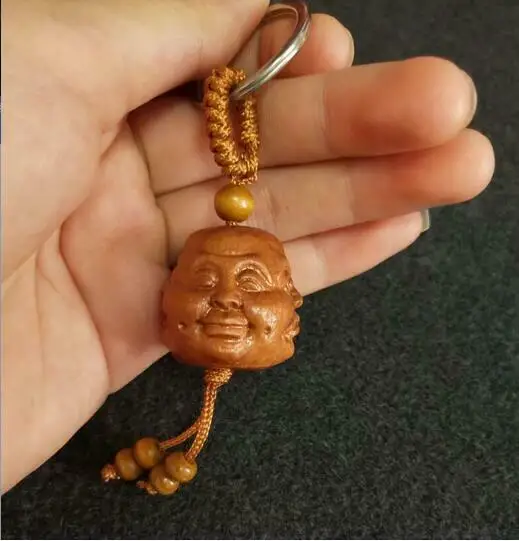 

Брелок из дерева "Радость, гнев, печаль, радость"