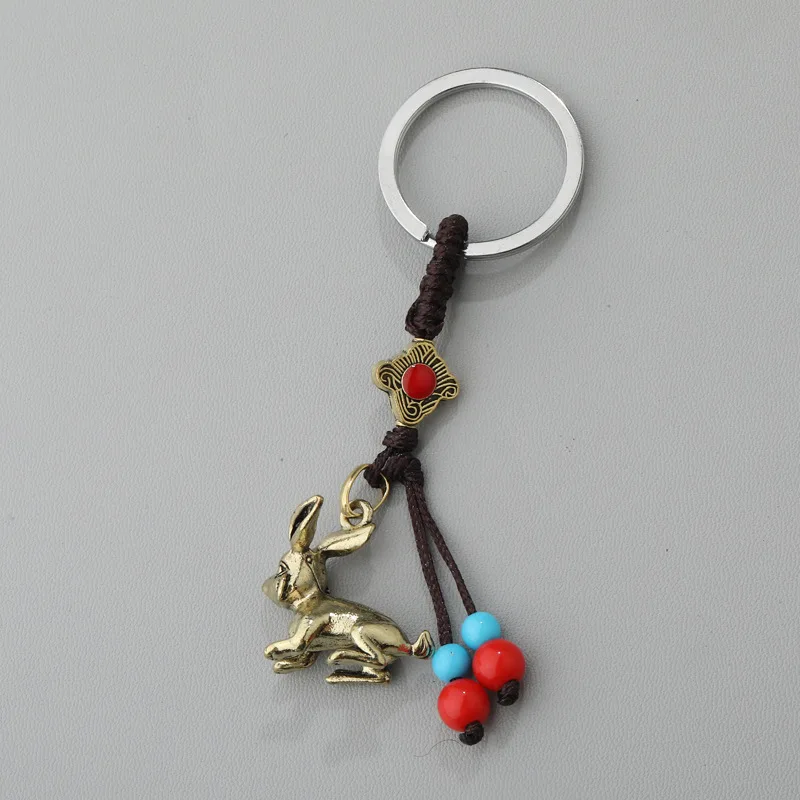 Металлический брелок в виде животных