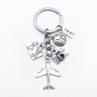 26 letter new tour around the world aircraft keychain to the earth camera small pendant keychain commemorative gift