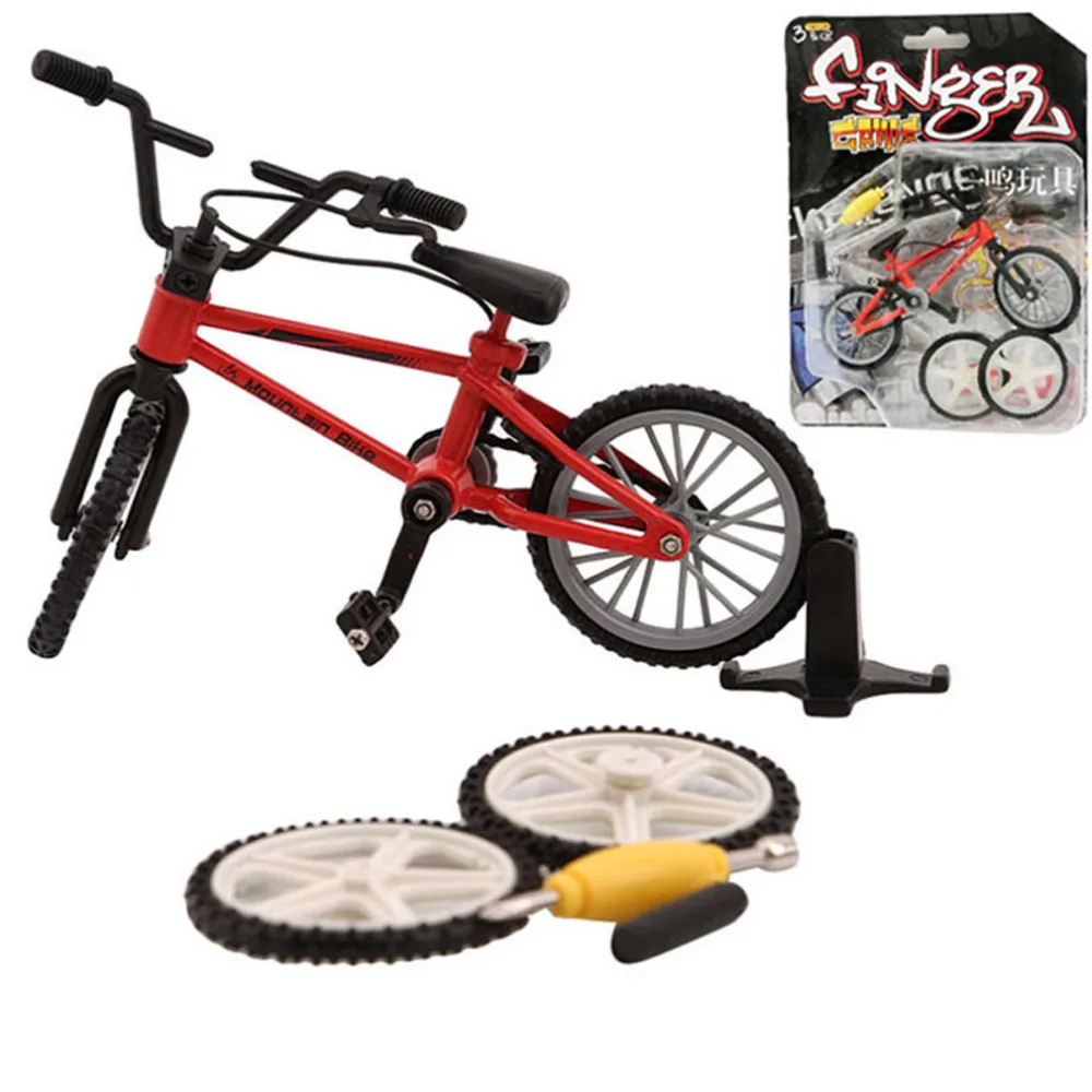 

1 Set Mini Finger Mountain Bikes Toys Retail Box + 2pcs Spare Tire Bicycle Baby Game Gift