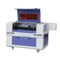 wood cutting laser machine engraving 1390 mini akj1390 laser and milling engraver machine