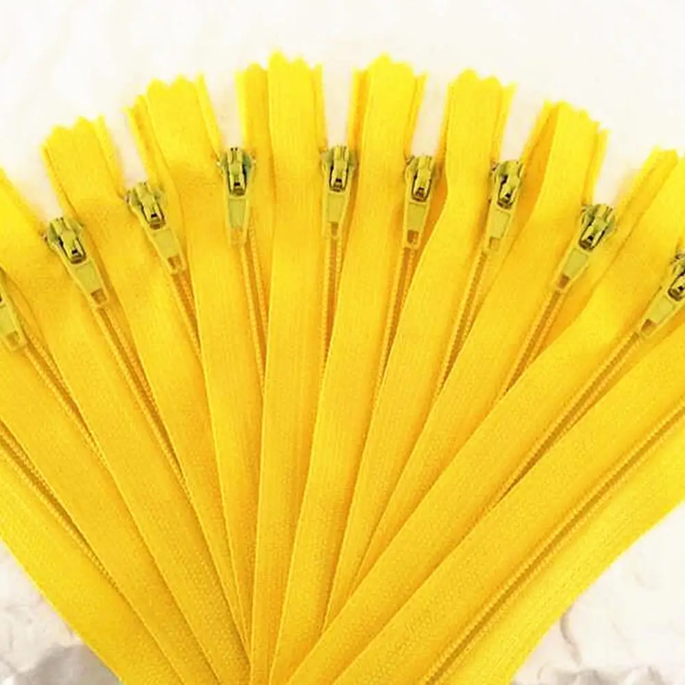 

10 pieces. Yellow 50cm (20inch) nylon coil, zipper, tailor, crafter and fgdqrs