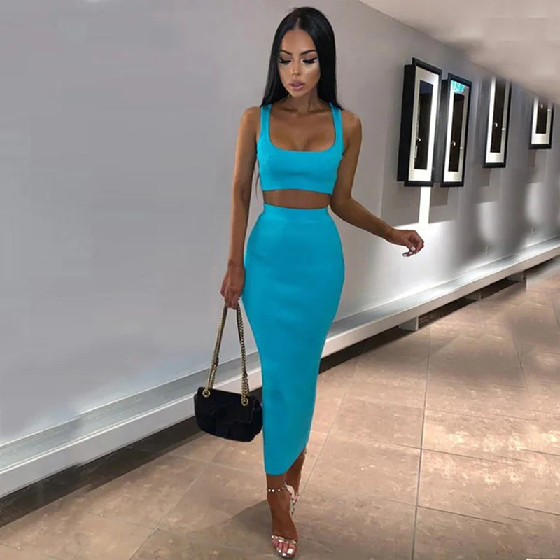 

GAOKE neon ribbed knitted women two piece matching set crop top midi skirt sexy festival party 2021 winter clothing