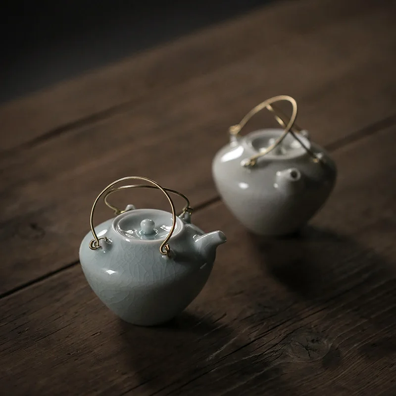 

Small Size Japanese Style Teapot Ceramic Hand Made Simple Handle Teapot Ice Cracked Glaze Tetera Cristal Kitchen Supplies EF50TP