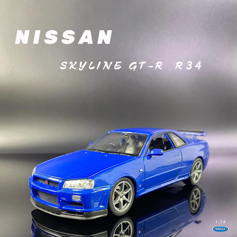 Модель автомобиля WELLY 1:24 голубая модель Nissan Skyline GTR (R34) из сплава коллекционная