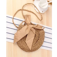 lovely bowknot is worn tassel woven bales manual hook is colored small round straw bales one shoulder female scarves beach bags