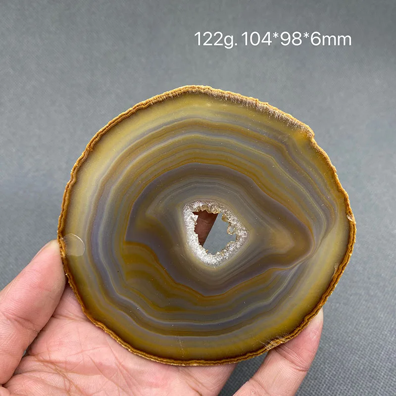 

Натуральный агат, отполированный образец руды с хрустальным отверстием